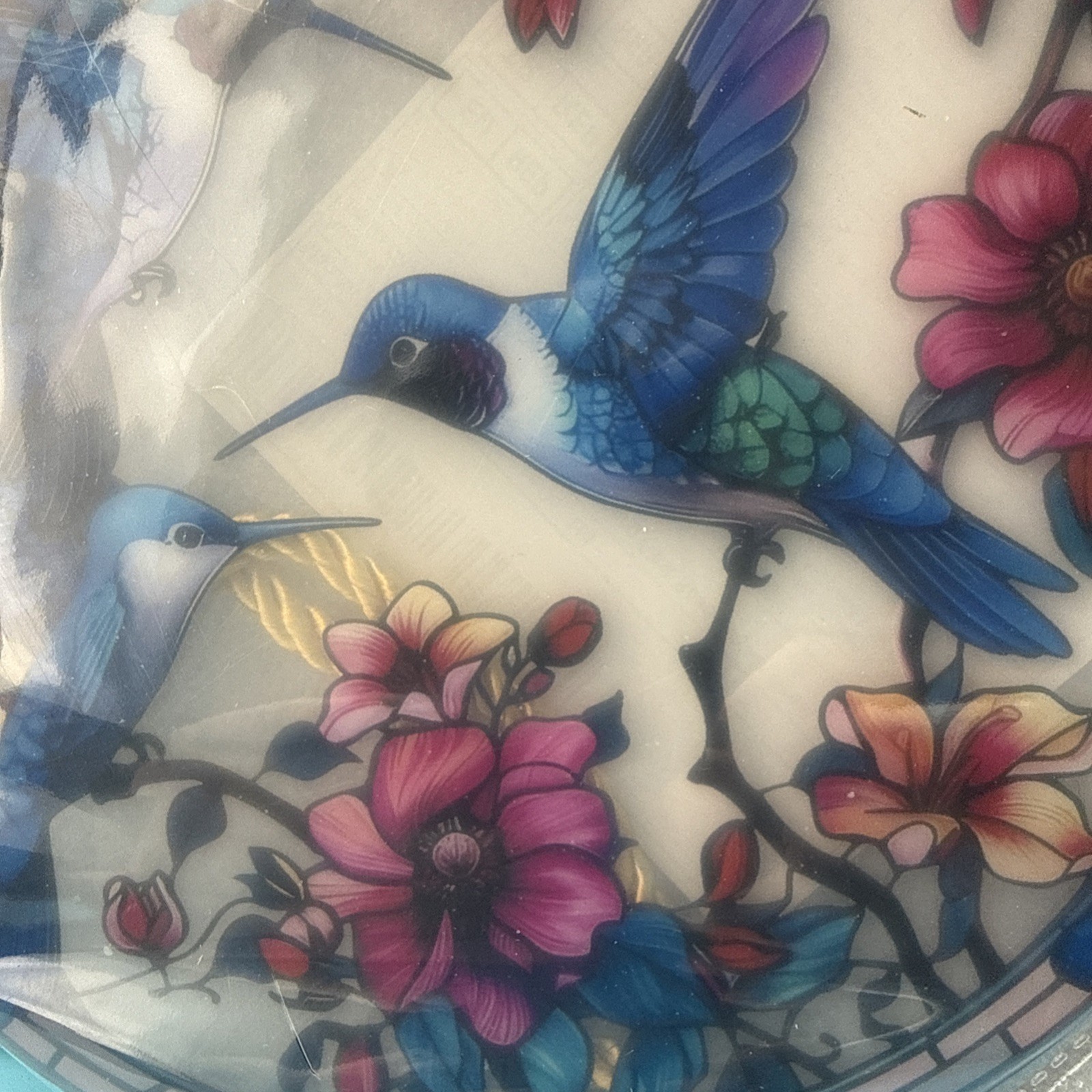 8 inch round acrylic with 3 blue hummingbird