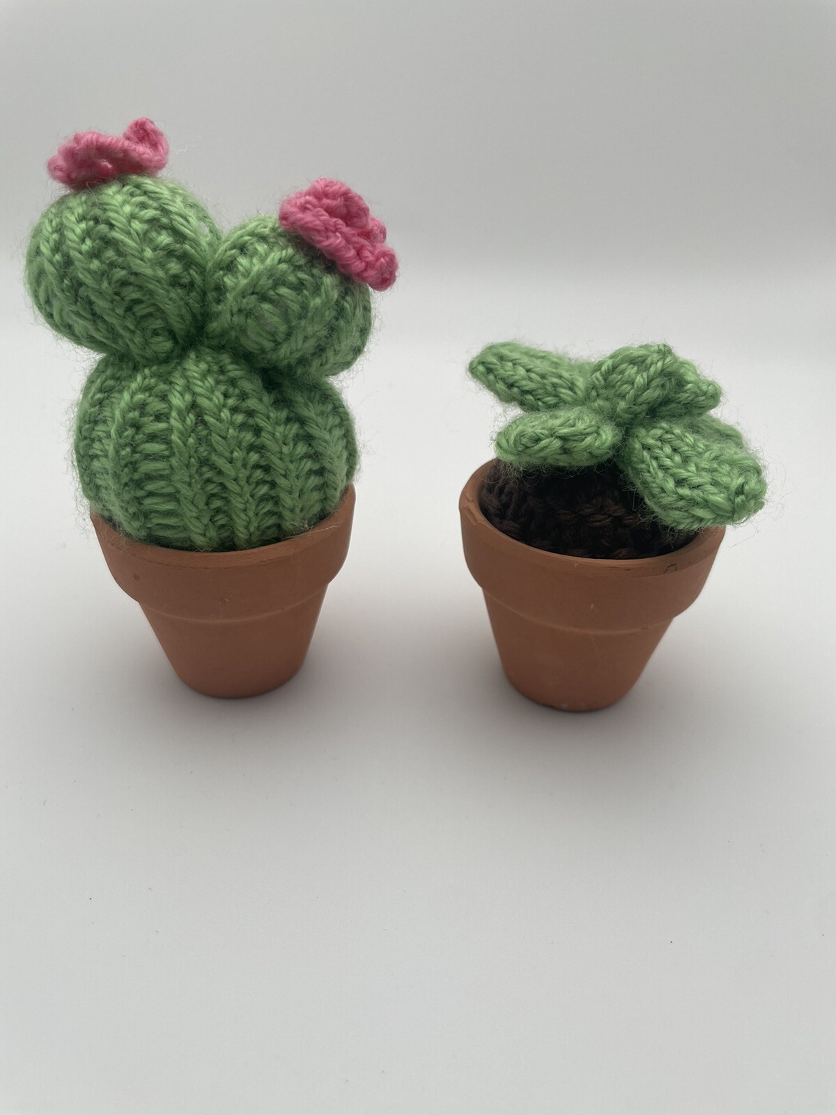 Two Small Knit Cactus Potted Plants Pink & Green In Small Terracotta Pots