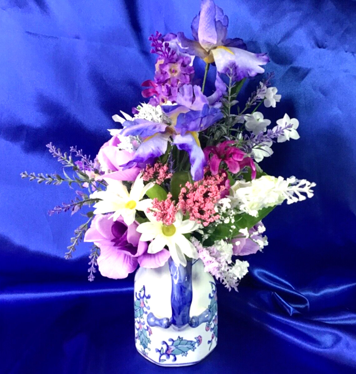 Beautiful Leaf Design Ceramic Pitcher with a Multicolor Floral Arrangement