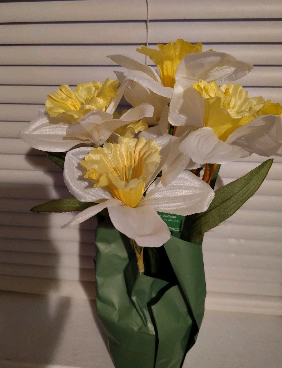 Artificial Yellow And White Daffodils In Pot With Paper