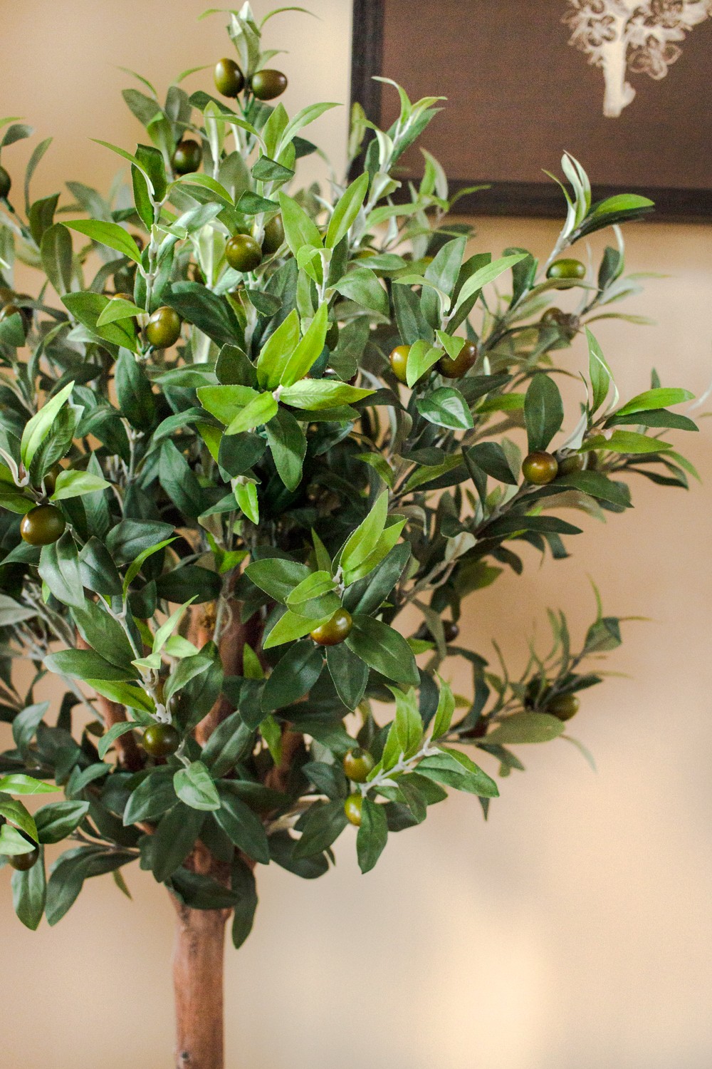 Nearly Natural 4.5ft Olive Topiary Tree with European Barrel Planter in Green