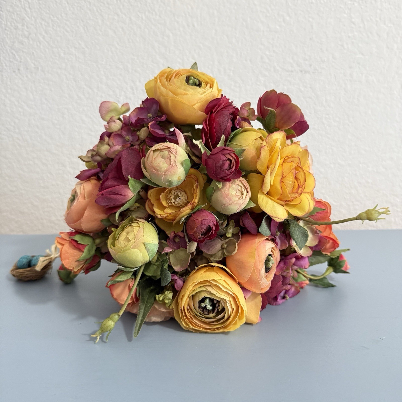 Beautiful Flower Arrangement in Glass Vase with Faux Water.