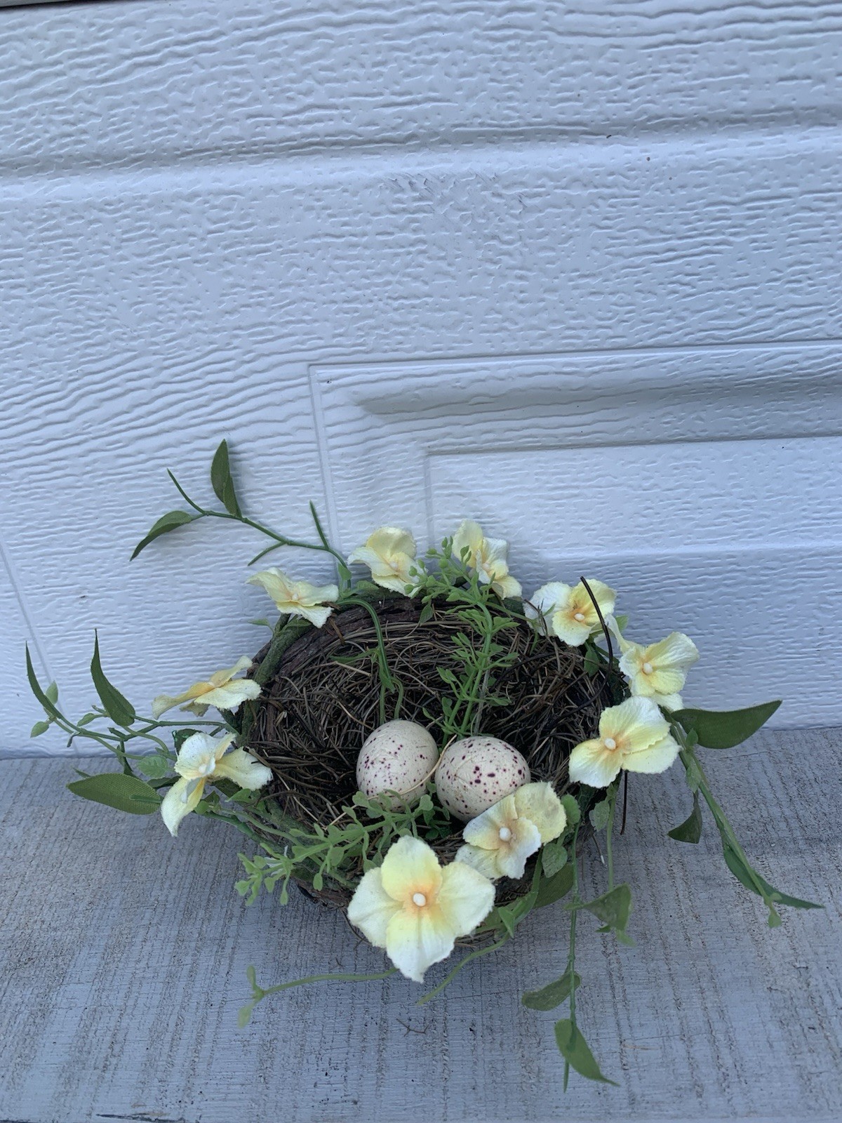 Decorative Bird’s Nest With 2 Faux Eggs And Yellow Artificial Flowers Spring