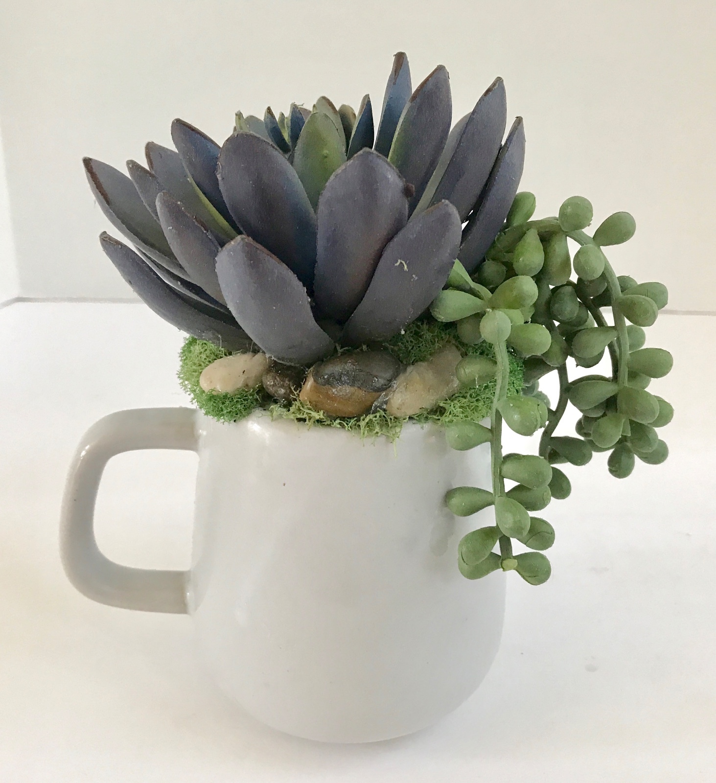 Decorative Artificial Purple and Green Grass Succulents in a Blue and White Mug