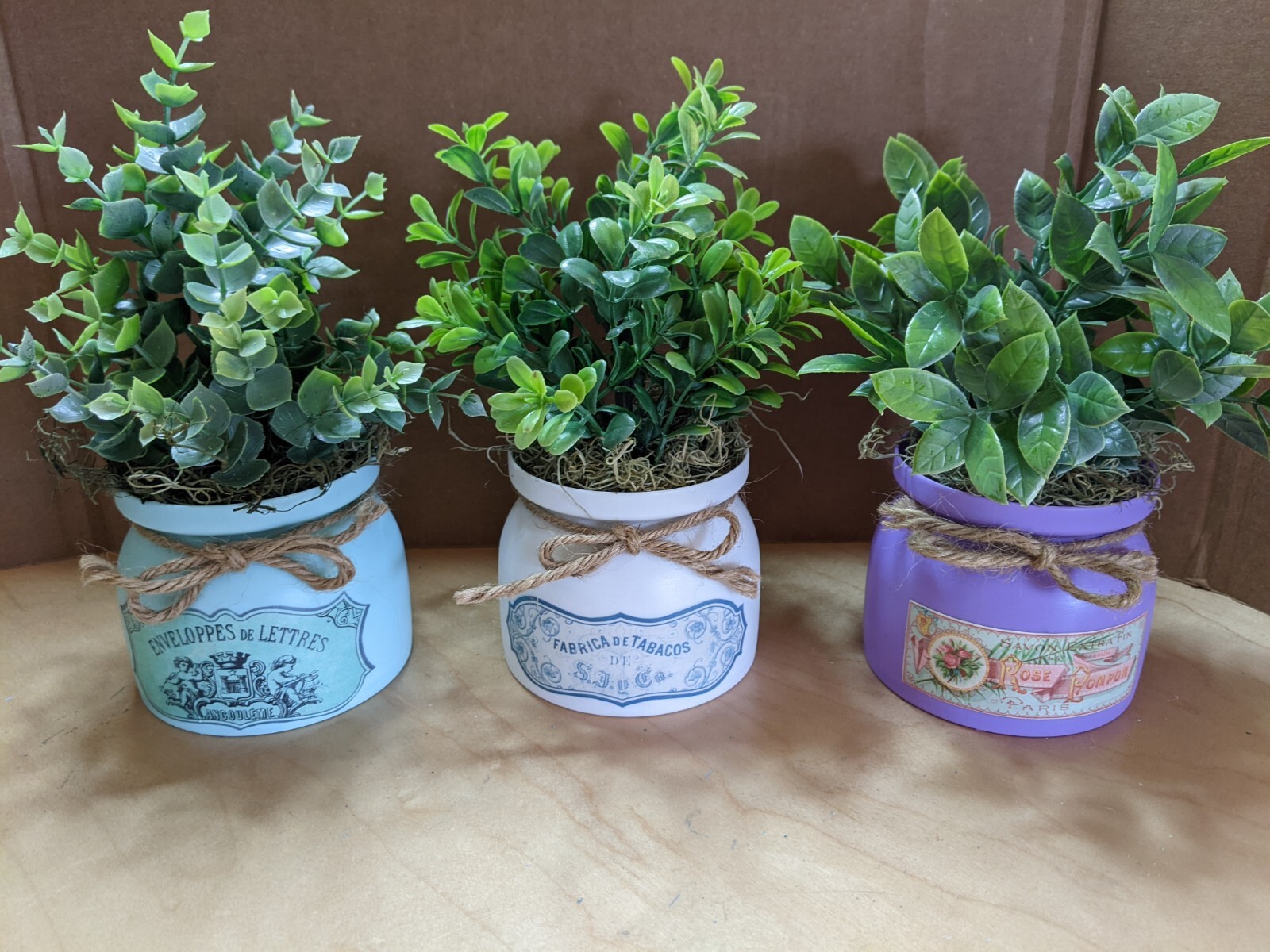 3 Faux Plants in Spring Themed Pots