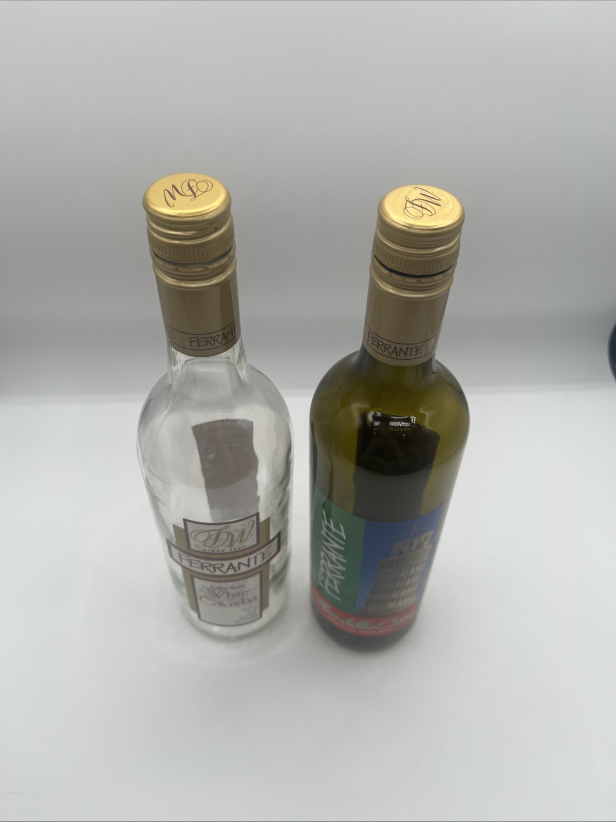 Ferrante Winery Empty Wine Bottles One Clear One Green Great For Deco Or Crafts