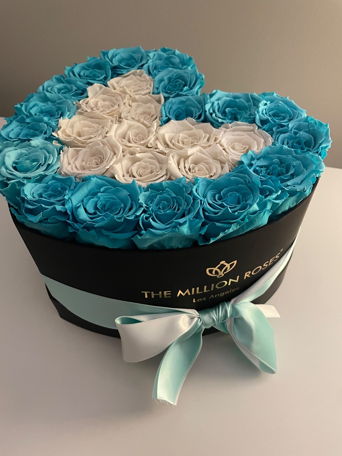 the million roses, turquoise flowers that last forever