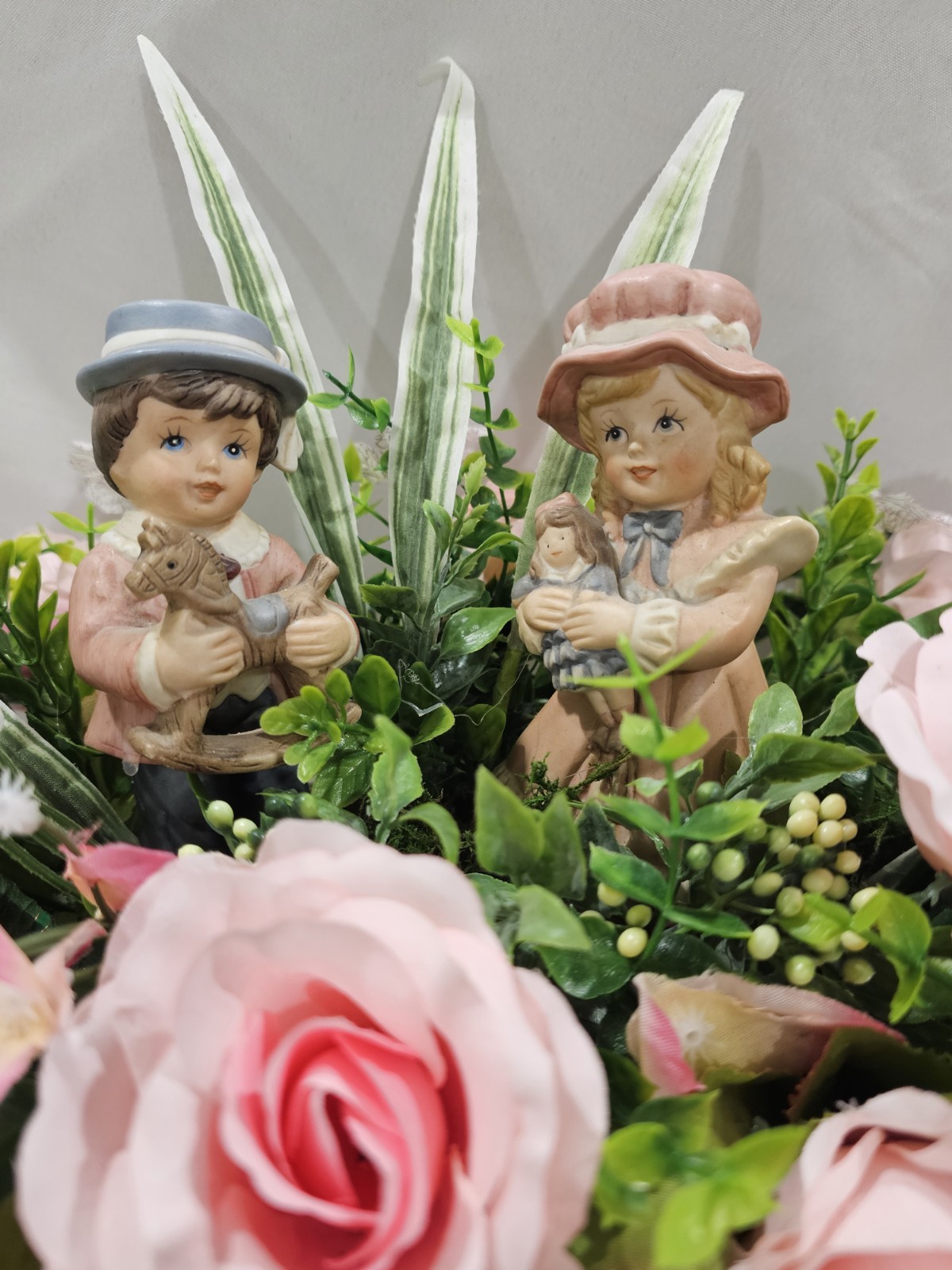 Lovely Floral Centerpiece, Pink Roses, 2 darling children. 15″W in solid wood