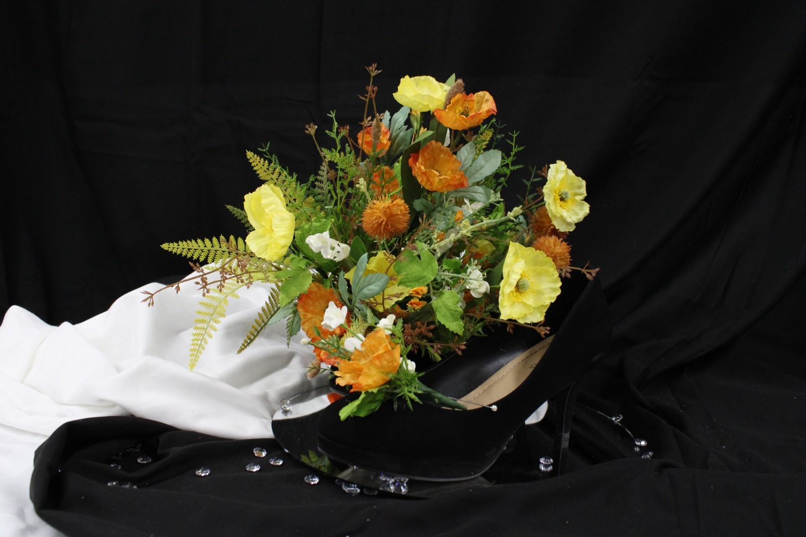 Yellow and orange poppy floral bouquet and matching boutonierrie