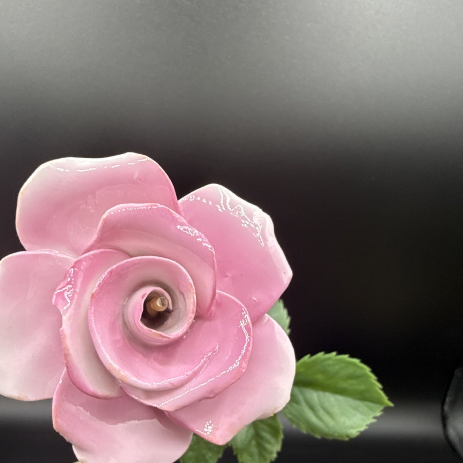Porcelain flowers, pink roses with plastic stems and leaves