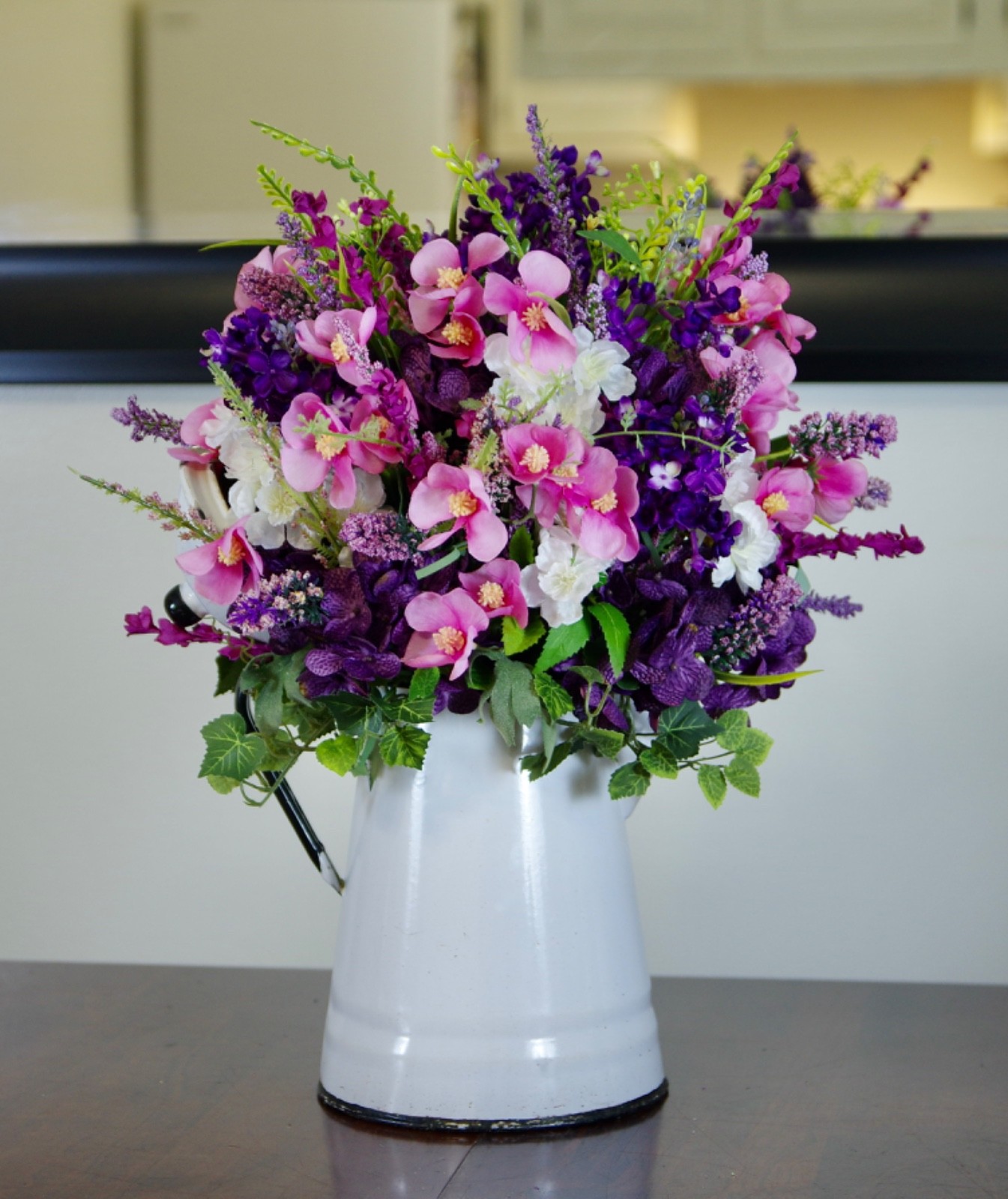 Silk Pink and Purple Arrangement in a Vintage Enamel White Cowboy Coffee Pot