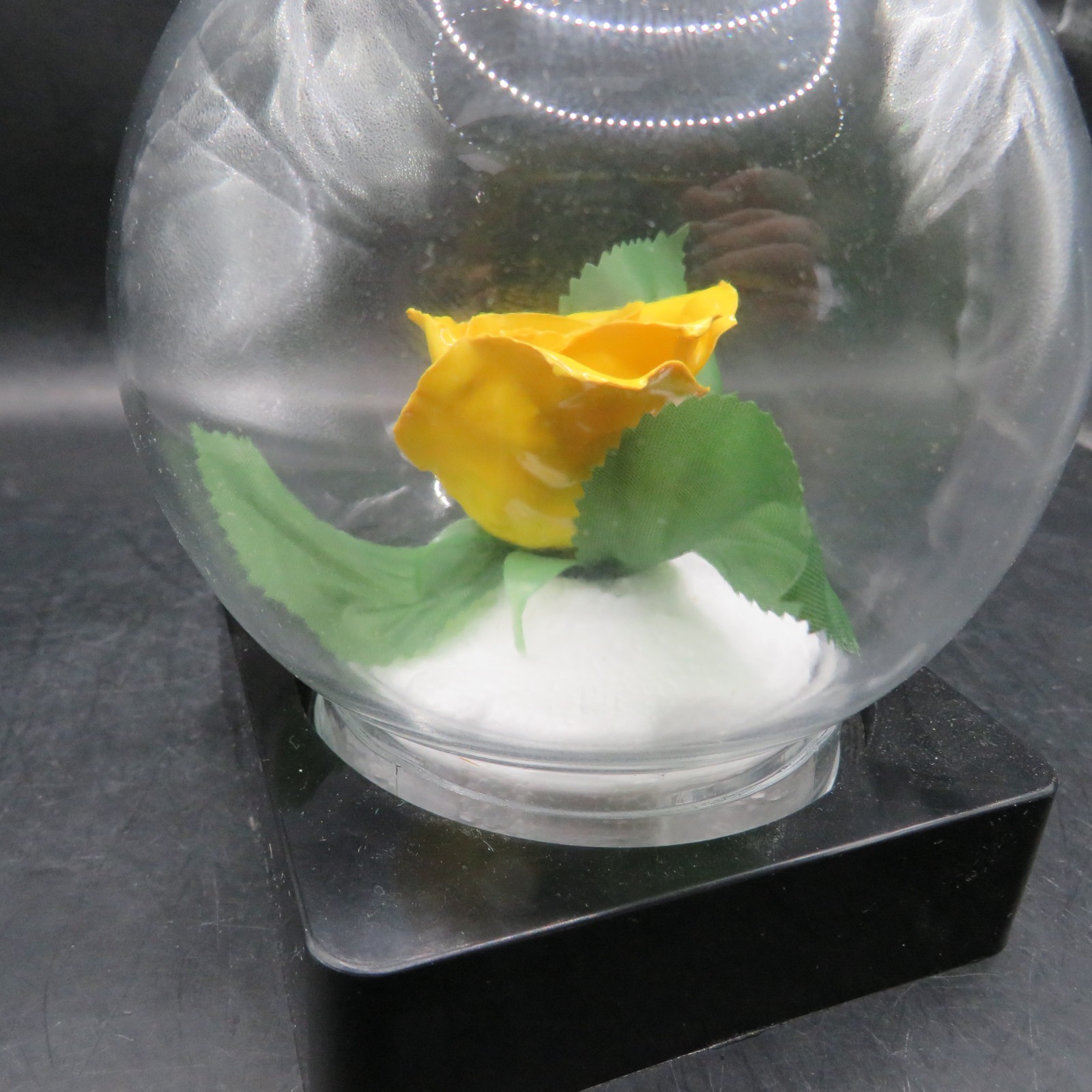 Lifesake Flowers REAL ROSES Yellow Rose In a clear globe on a back base.
