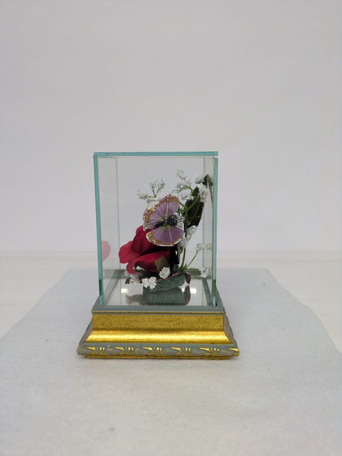 RED ROSE IN GLASS WITH PURPLE BUTTERFLY