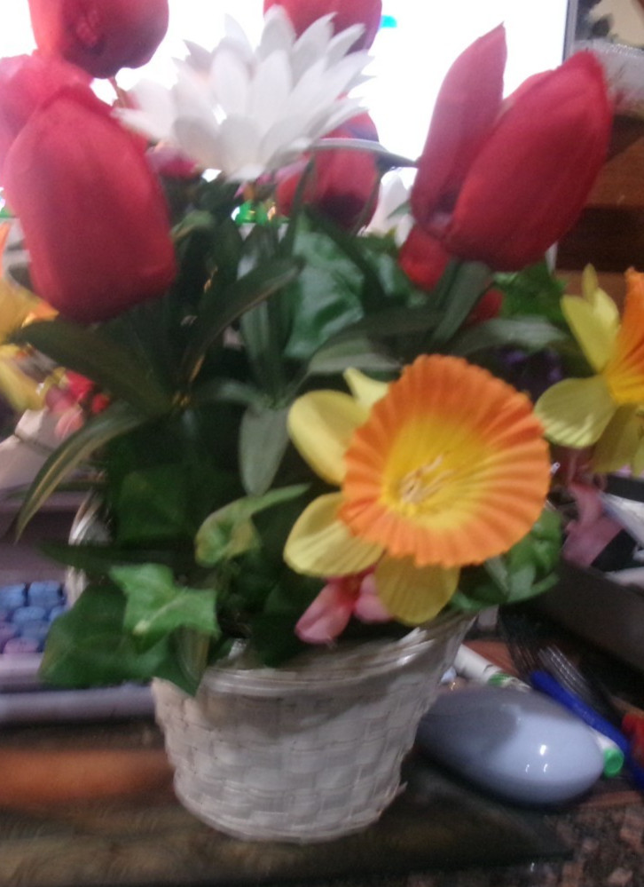 WHITE BASKET FULL OF ARTIFICIAL FLOWERS DARK PINK TULIPS AND YELLOW DAFFODILS AN