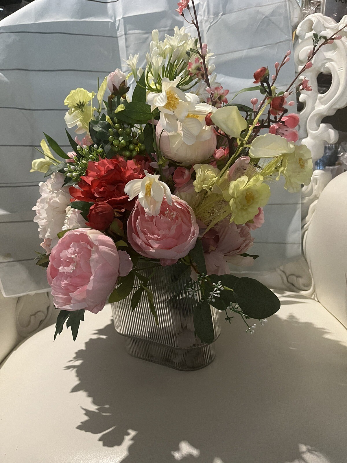 Custom made Lush Luxurious flower arrangements In a Mid century Ribbed Vase