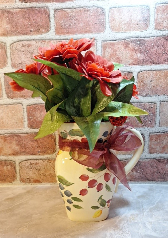 Floral Arrangement Centerpiece with Red Zinnia Faux Flowers in a Grape Vine Vase