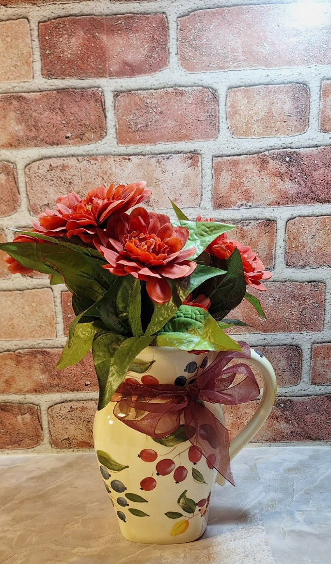 Floral Arrangement Centerpiece with Red Zinnia Faux Flowers in a Grape Vine Vase