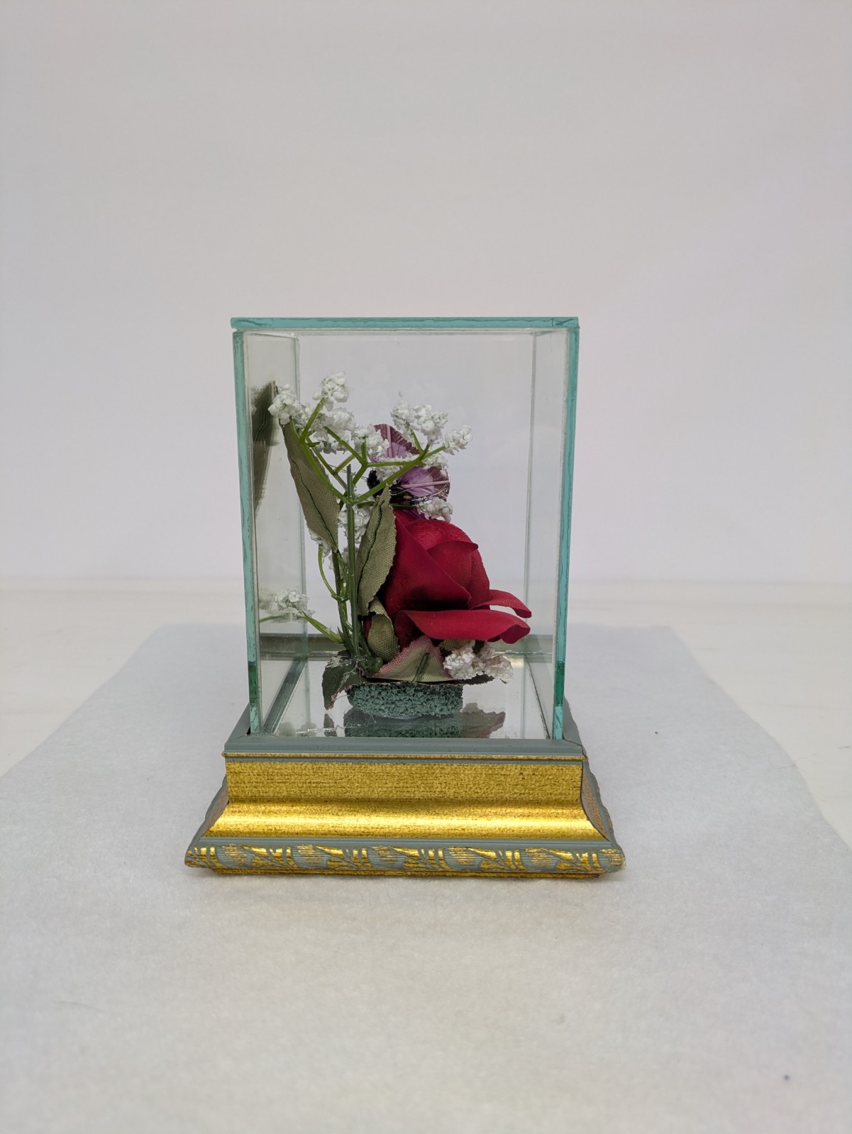 RED ROSE IN GLASS WITH PURPLE BUTTERFLY