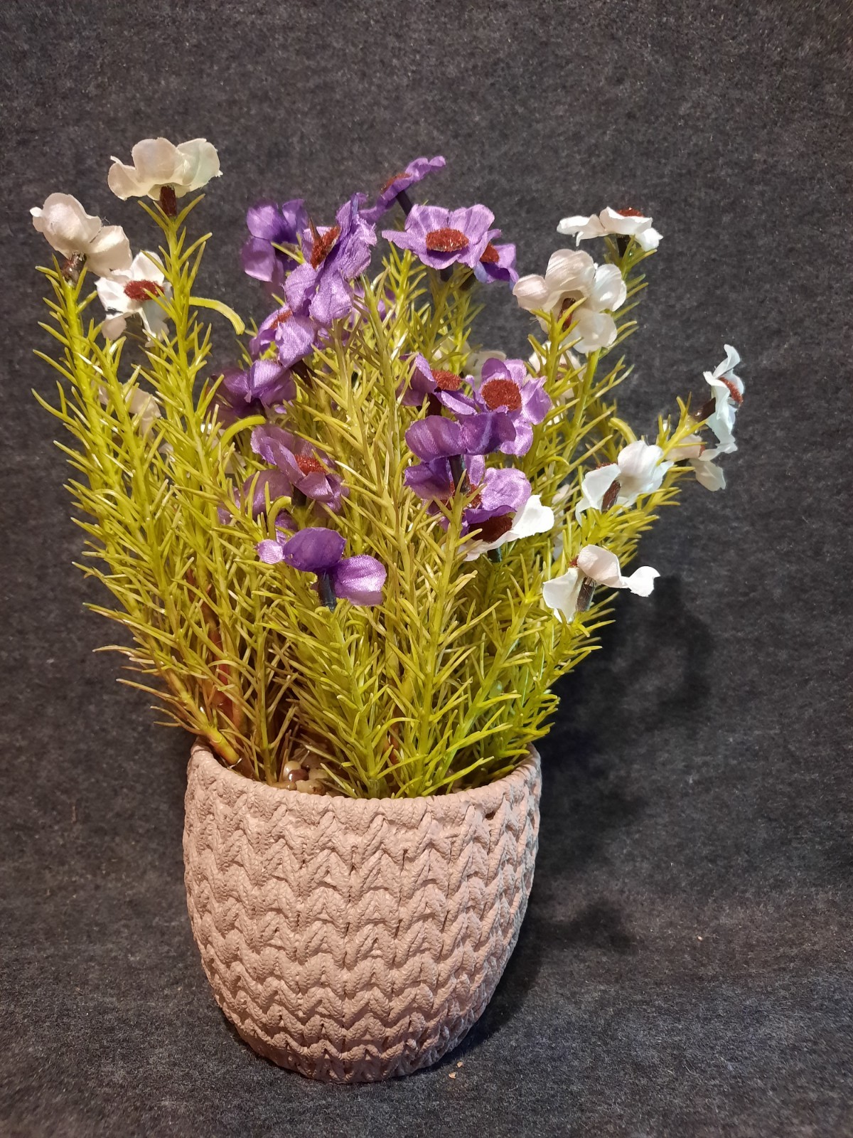 Dainty Faux Purple & White Flowers & Greenery In Woven Design Resin Flower Pot!