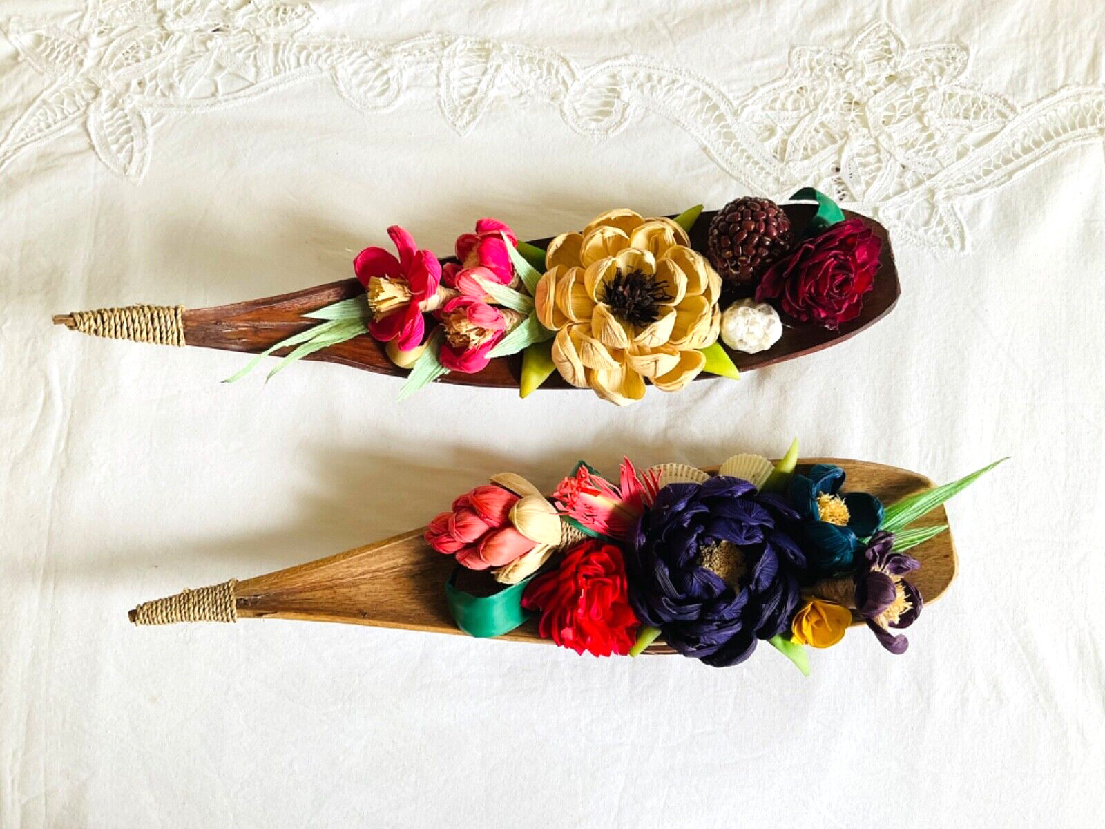 flower arrangements. Coconut spathe vase, dried corn husks, naturals.