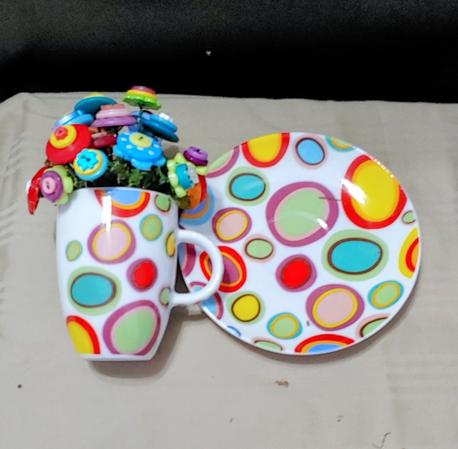 Rainbow Button Bouquet in mini polka dot cup and saucer. only 5 inches tall!