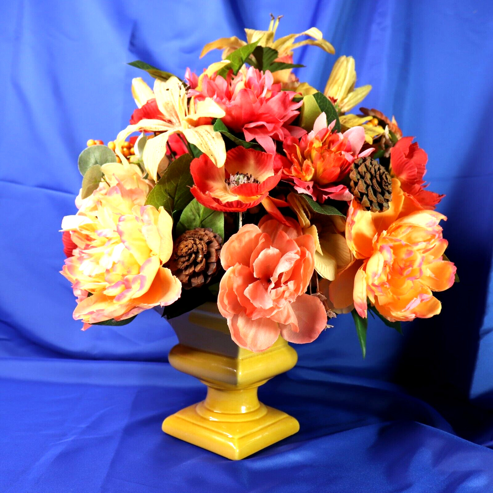 Lovely Floral Arrangement In Shades of Coral Pink & Yellow in a Square Planter