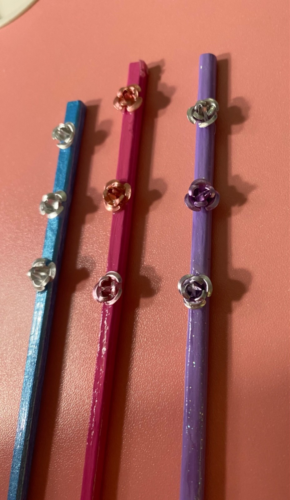 3 plant stakes/metal flowers