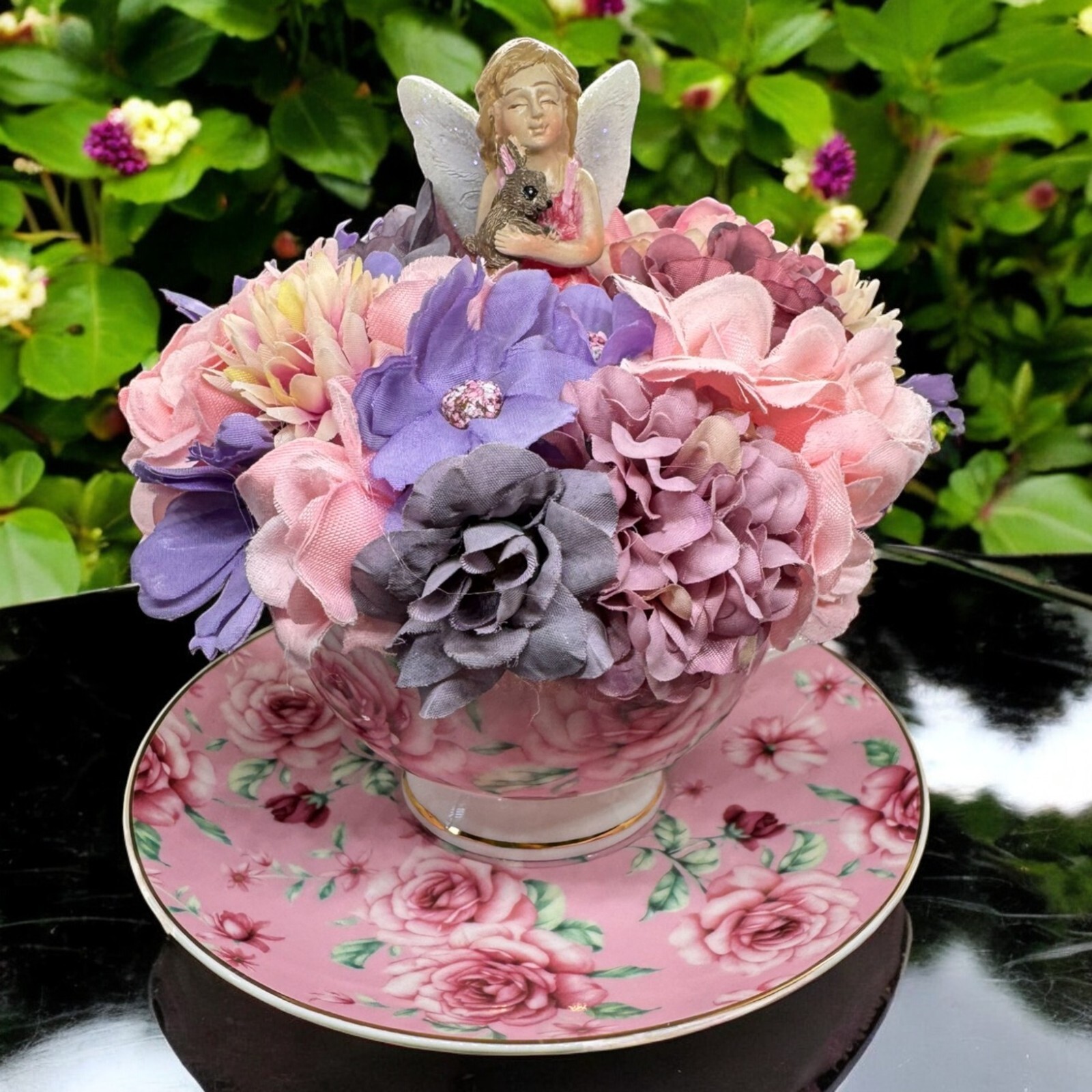 Pink Teacup Flower arrangement With Fairy
