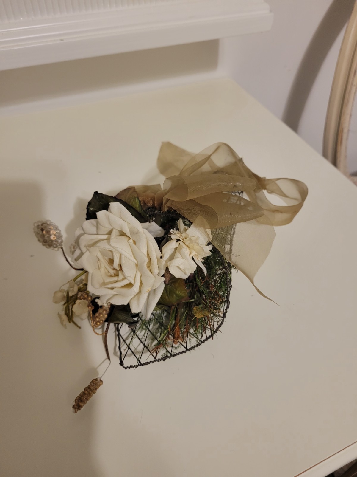 Artificial Ivory Rose Wall Decor Arrangement, Black Mesh, Beige Ribbon, Green