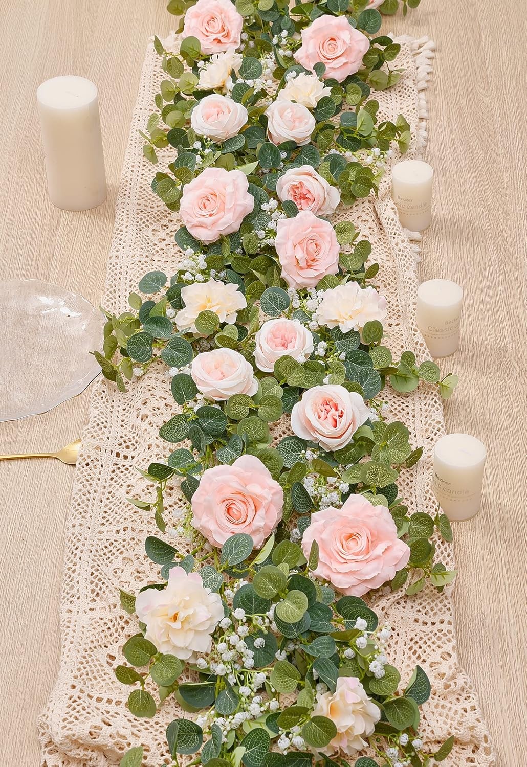 Artificial eucalyptus wreath with flowers, fake roses, and baby’s breath flowers