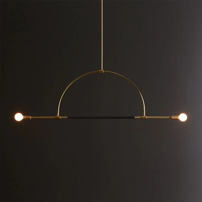 The Ellis Light is made from solid brass, with an optional leather wrap that is