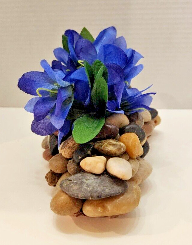 Touch of Spring, Lovely Blue Silk Flowers on a Bed of Polished Stones