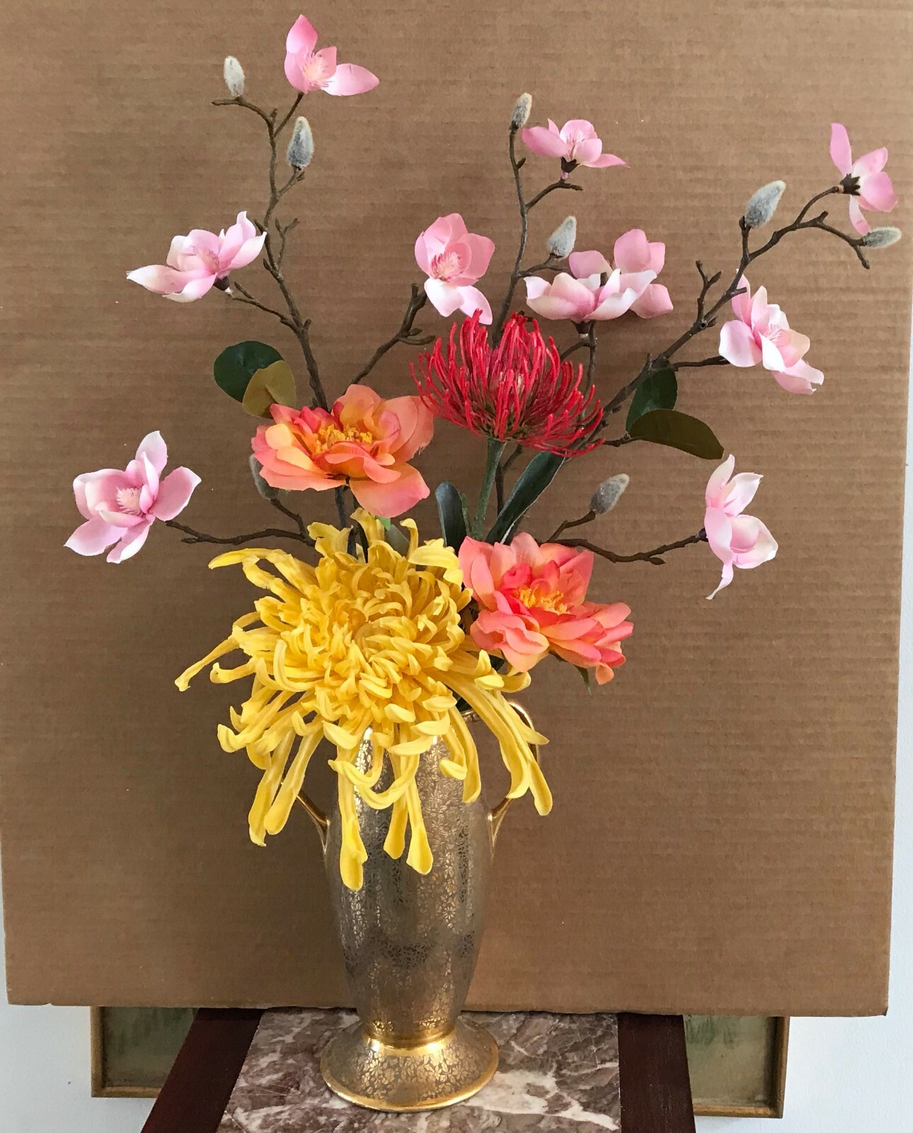 Floral Arrangement with Multi-Colored Silk Flowers in a Gold Colored Floral Vase