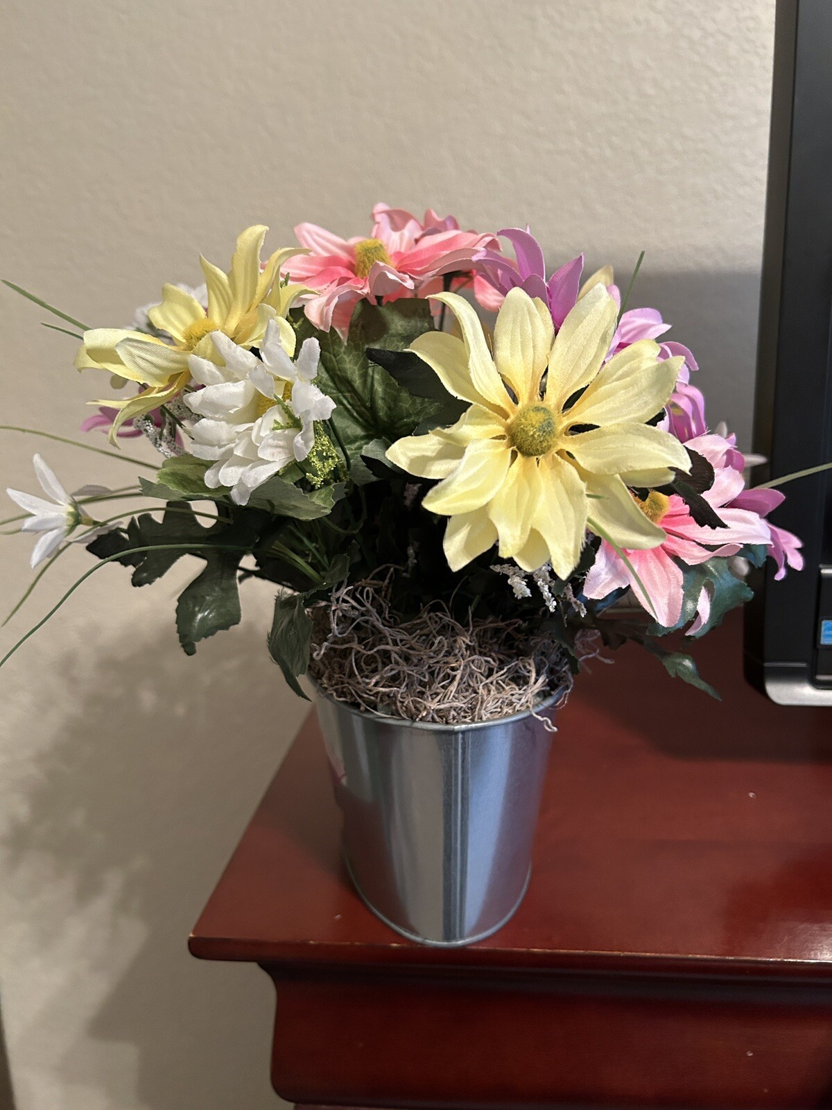Spring Flower Arrangement in a Silver Metal Canister with Flower and Bee Motif