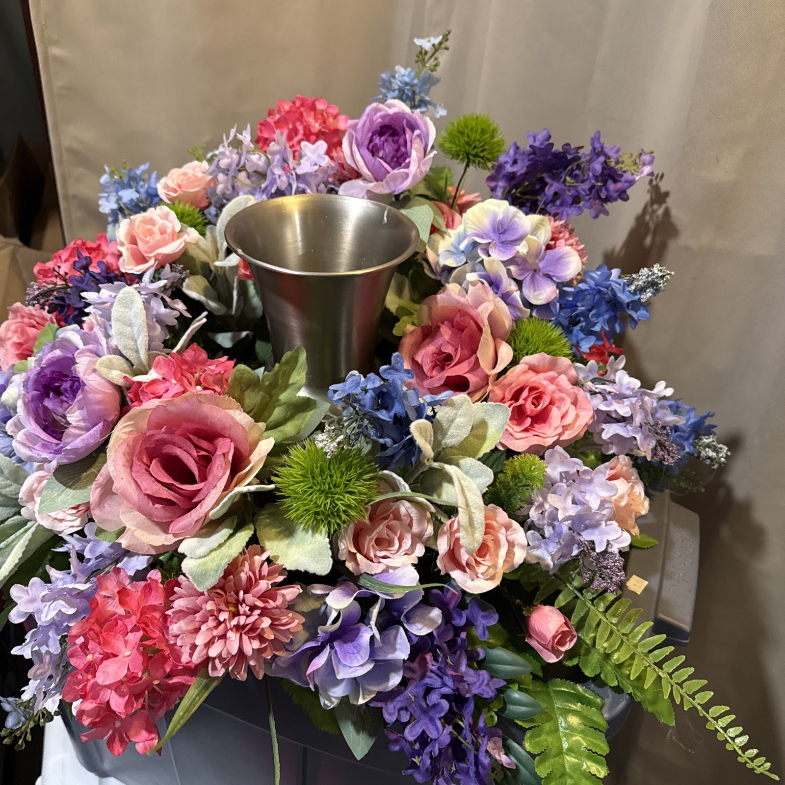 Floral Urn Ring Arrangement For Memorial Service 24” Round flowers Pinks, Blues