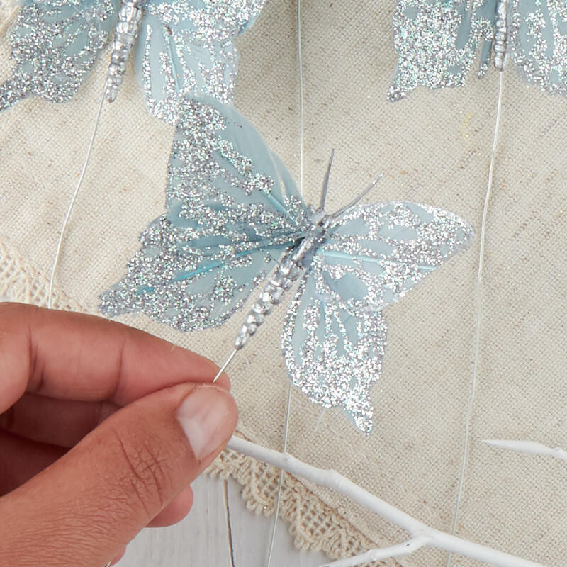 12 Sparkling Blue Feathered 2-3/4″ Butterflies with Silver Glitter