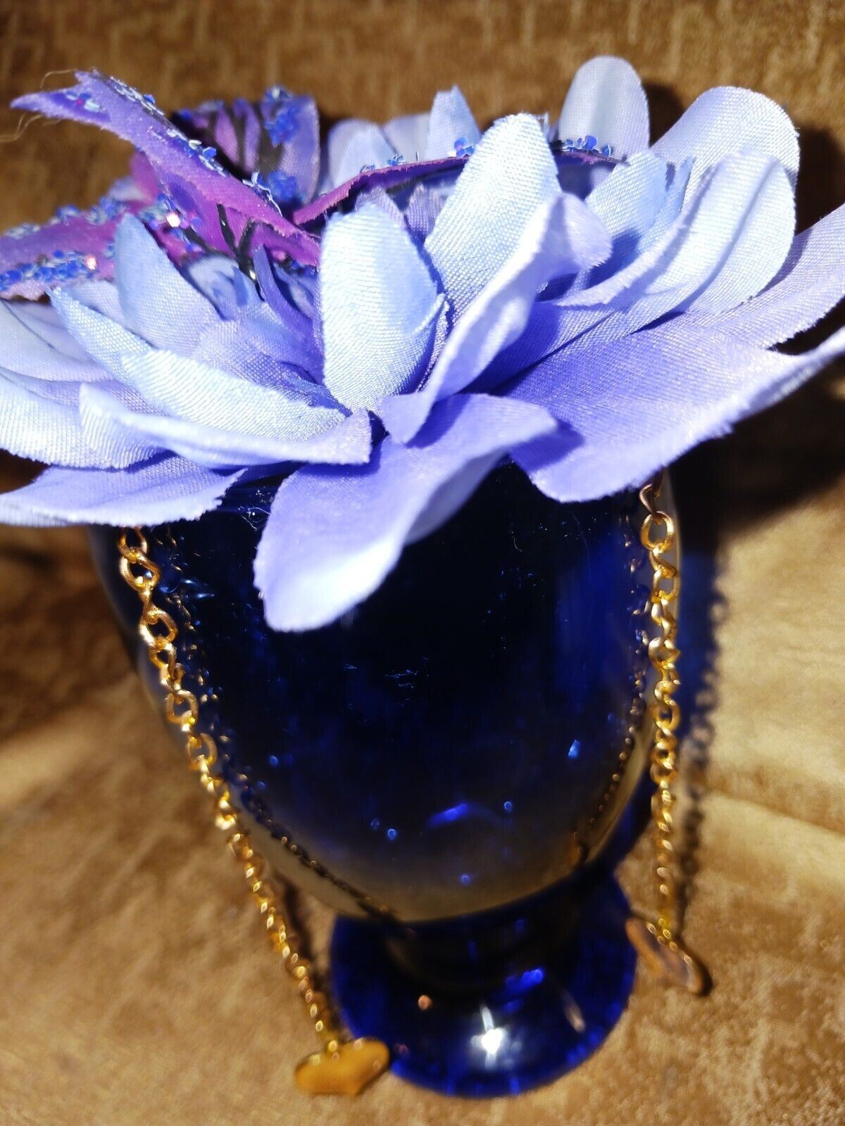 Artificial Flower Arrangement With Blue Glass Vase And Gold Chain Accent /Hearts