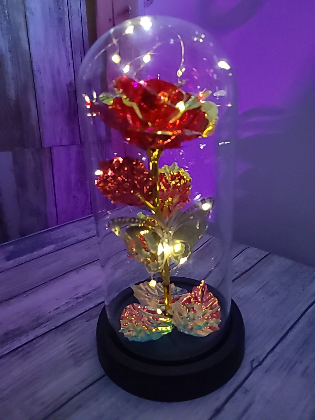 Light Up Rose In Glass With Butterfly And Rose Petals On The Bottom. Red/ Gold.