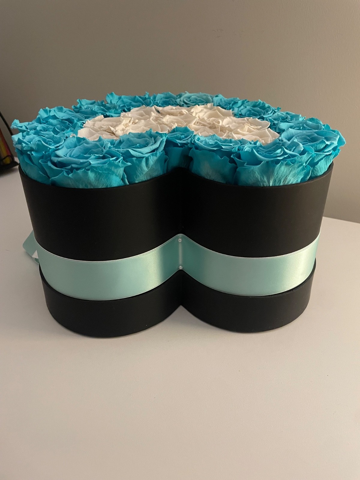 the million roses, turquoise flowers that last forever