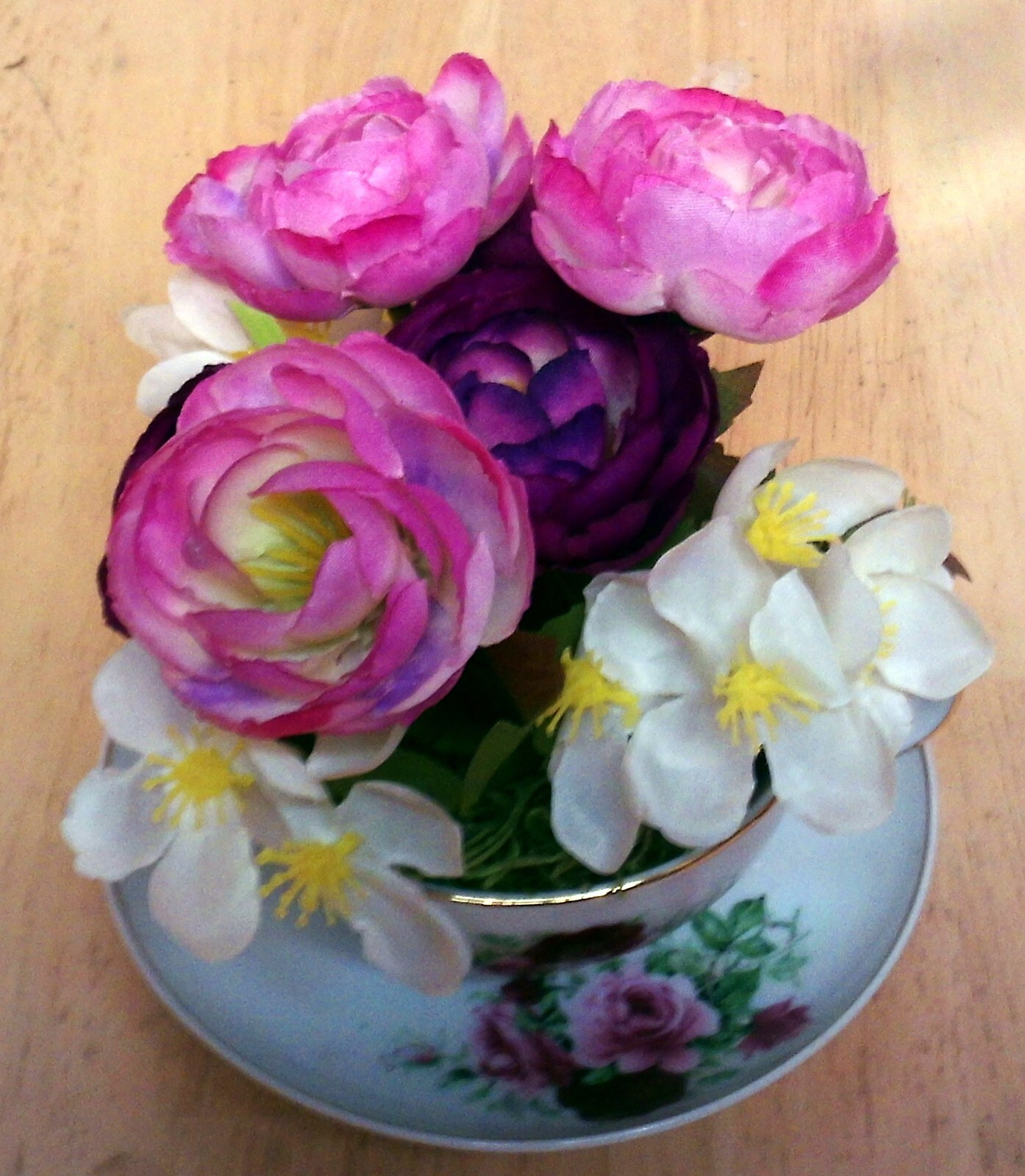 Tea cup floral arrangement