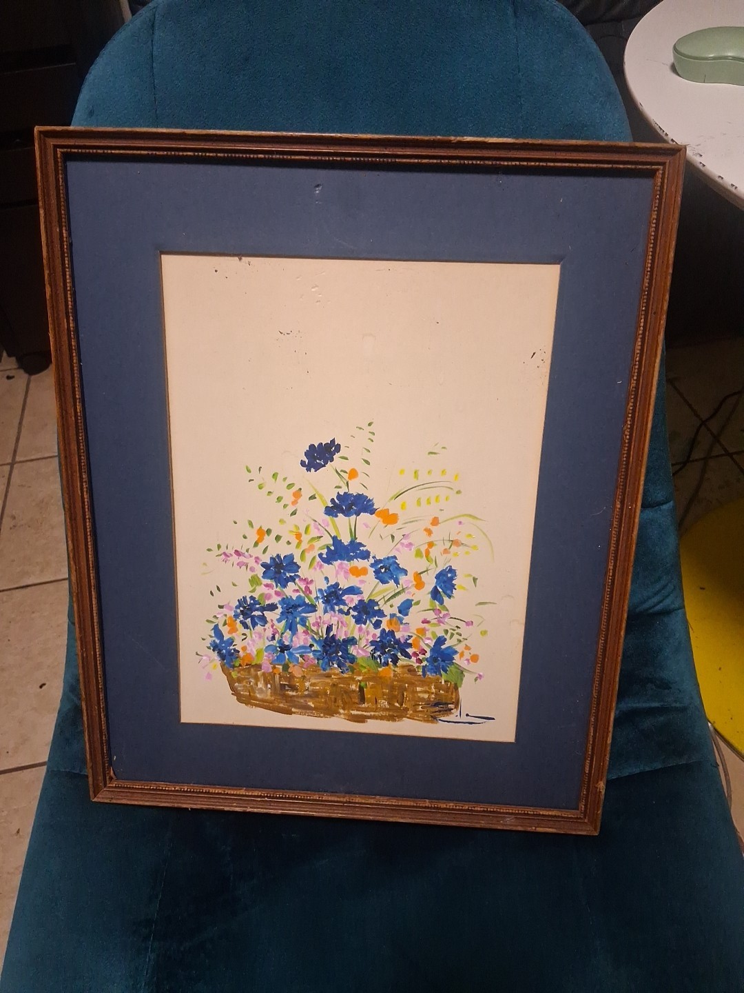 A Vibrant Arrangement of Blue Cornflower-style Blooms and Orange Flowers