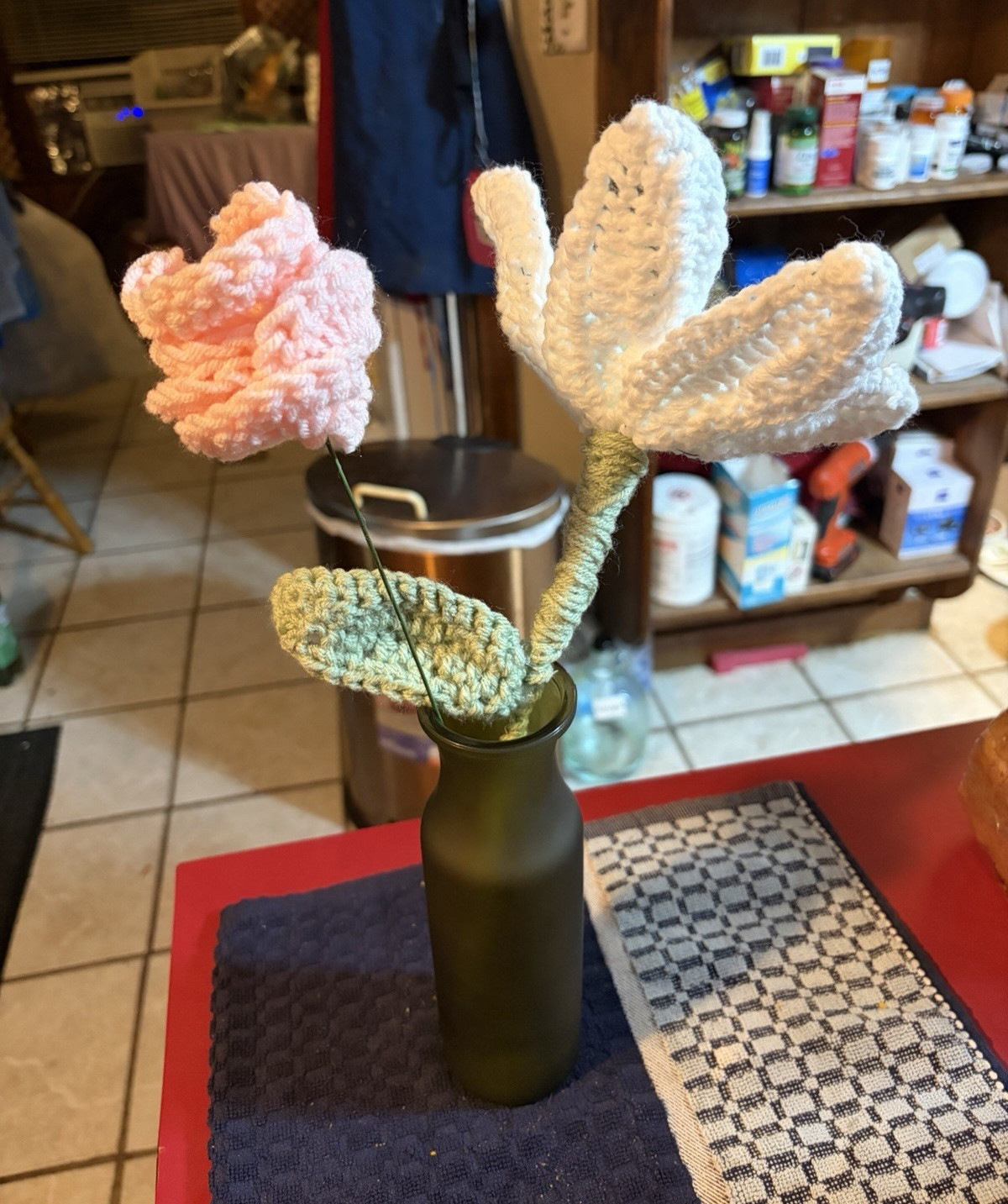 Handmade artificial crocheted lily floral arrangement, white/pink, green vase