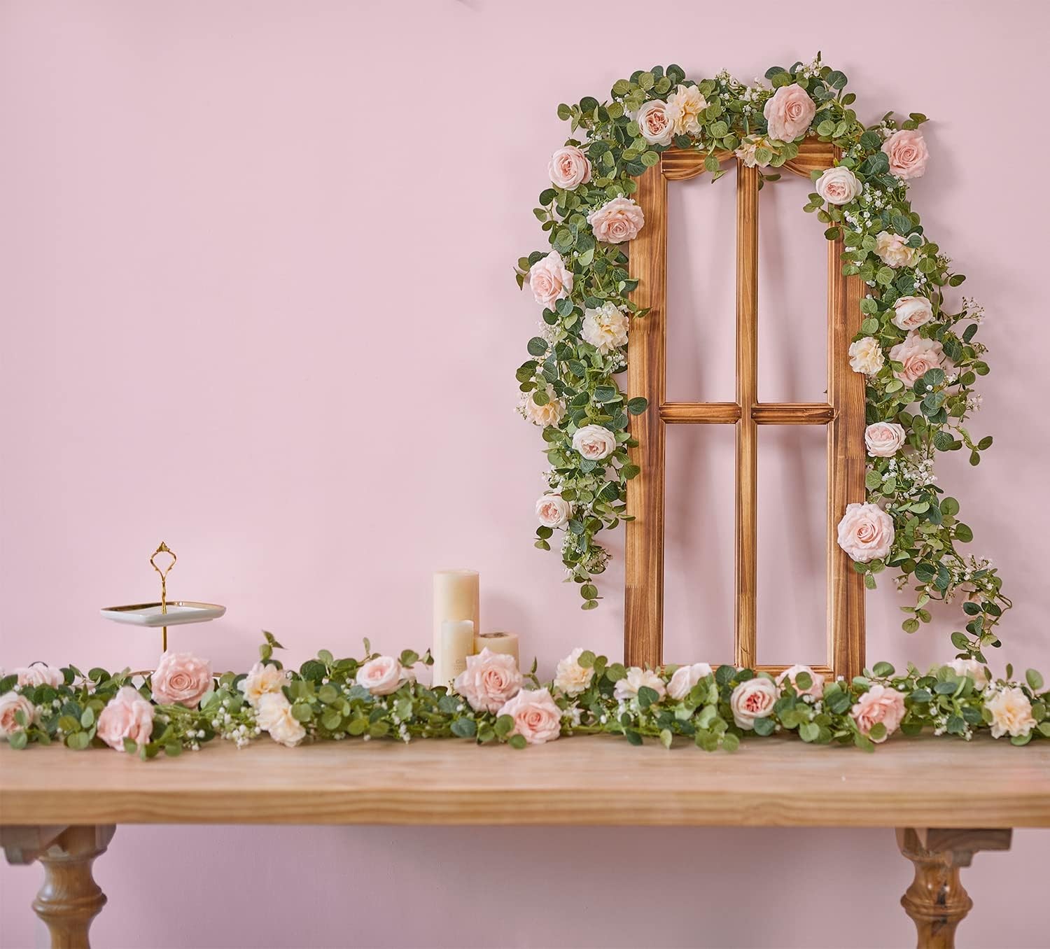 Artificial eucalyptus wreath with flowers, fake roses, and baby’s breath flowers