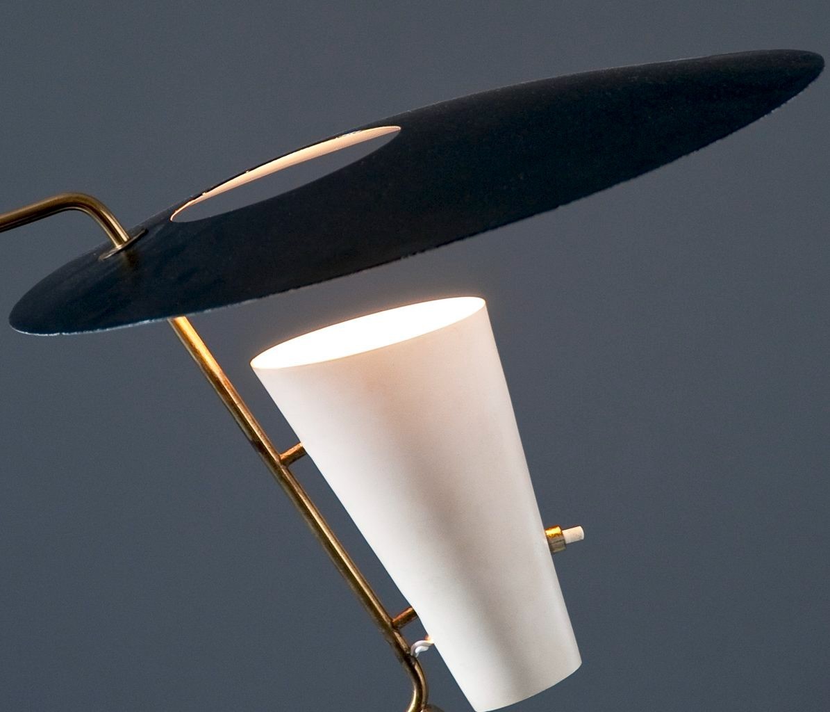 Here’s the information about the G24 table lamp by Pierre Guariche, shown at Gal