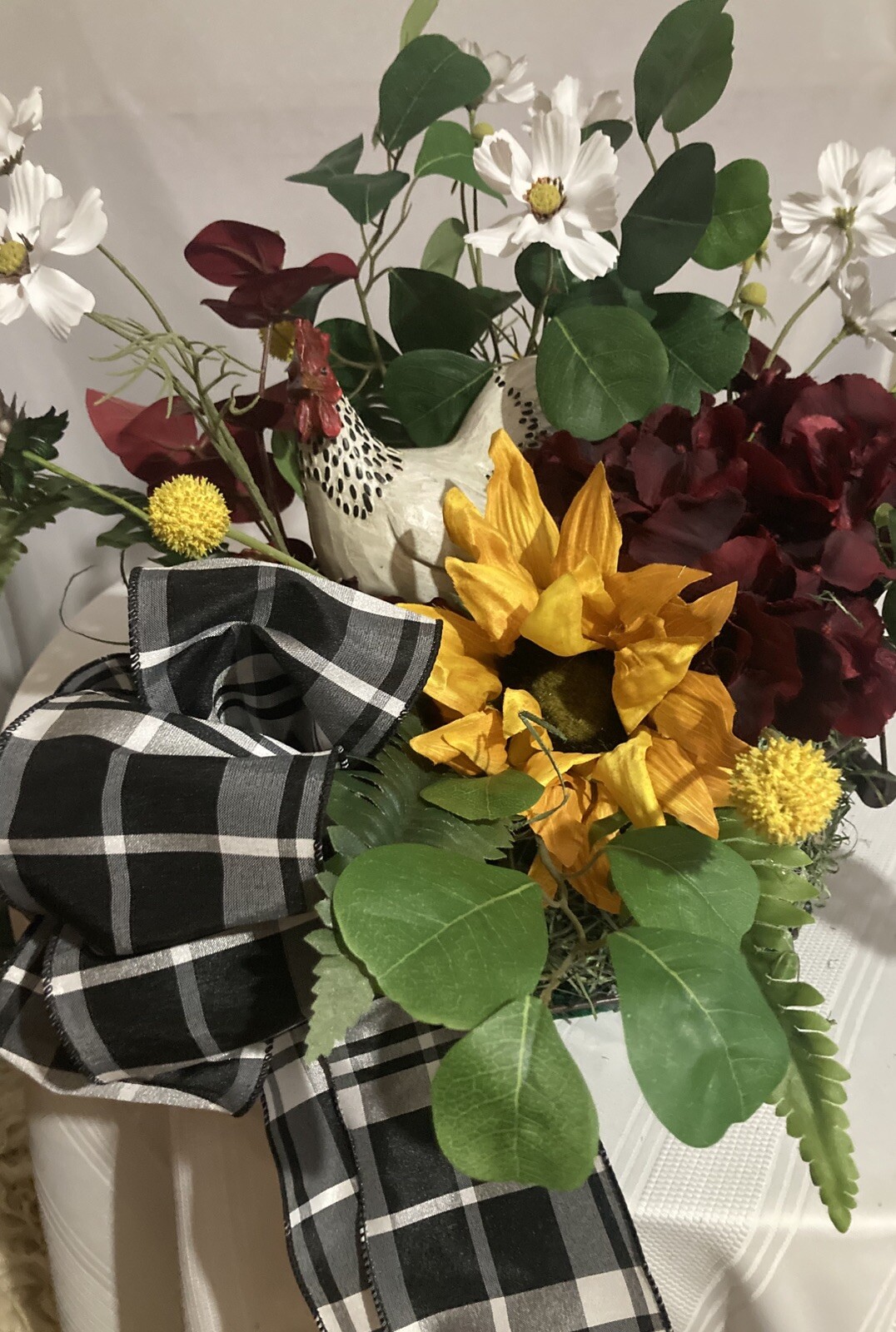 The Stately White And Red Rooster With White Cosmos And Yellow Sunflower
