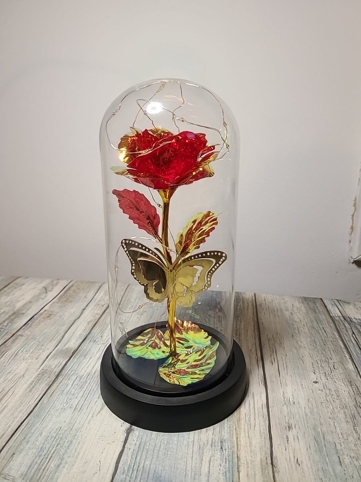 Light Up Rose In Glass With Butterfly And Rose Petals On The Bottom. Red/ Gold.