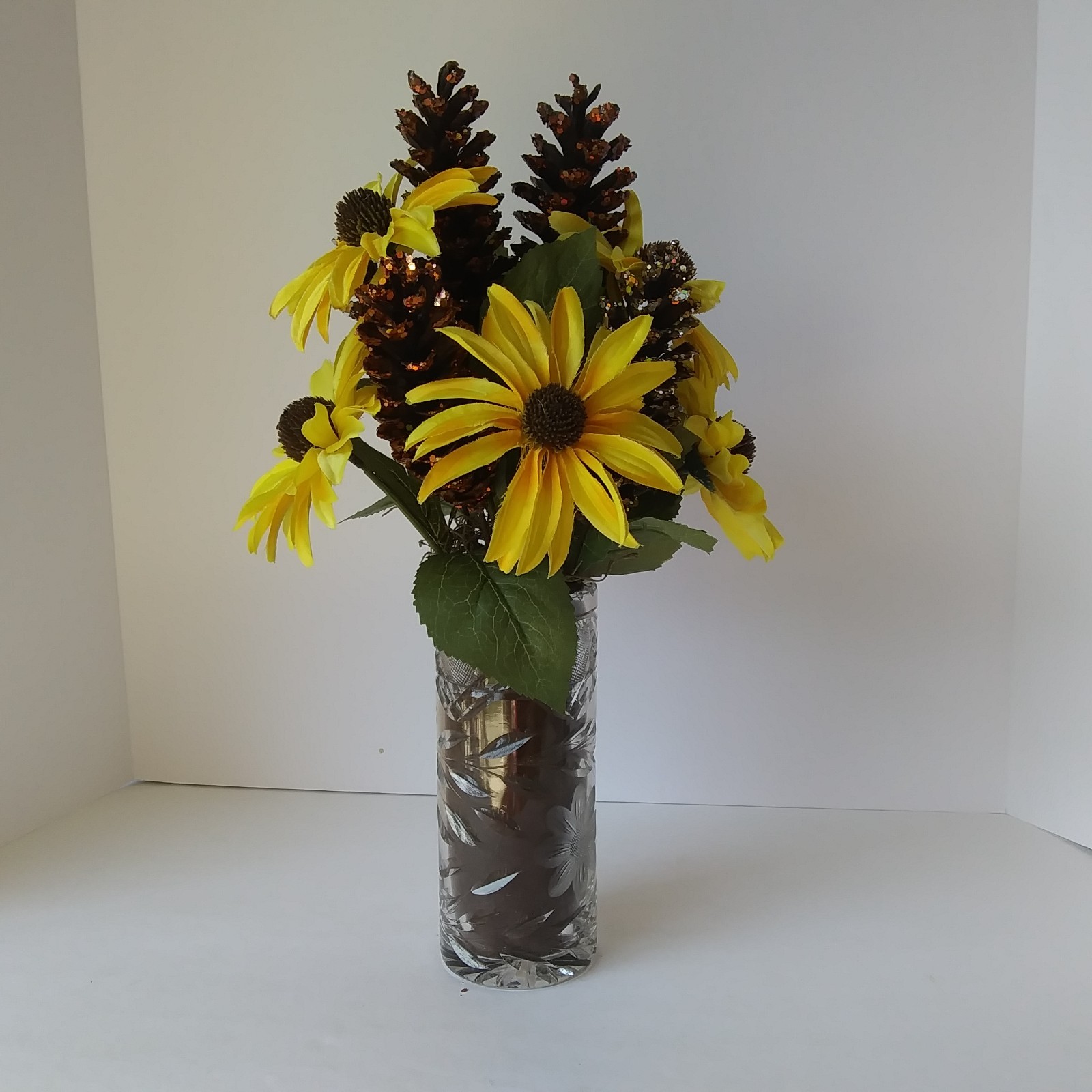 Artificial Yellow Sunflower & Pinecone Fall Arrangement in Cut Glass Vase Decor