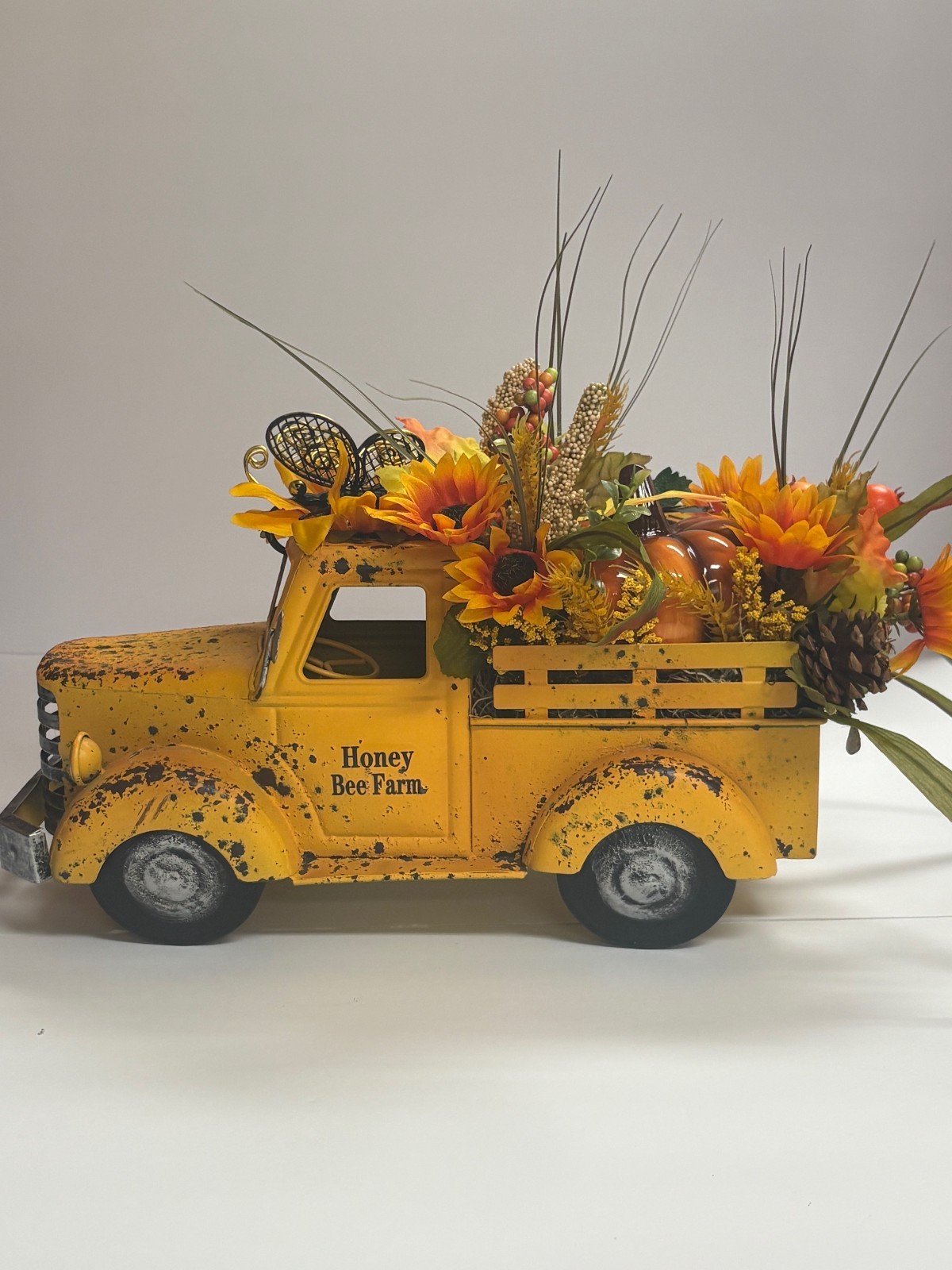 Rustic Yellow Honey Bee Farm Truck Planter with Sunflower Floral Arrangement
