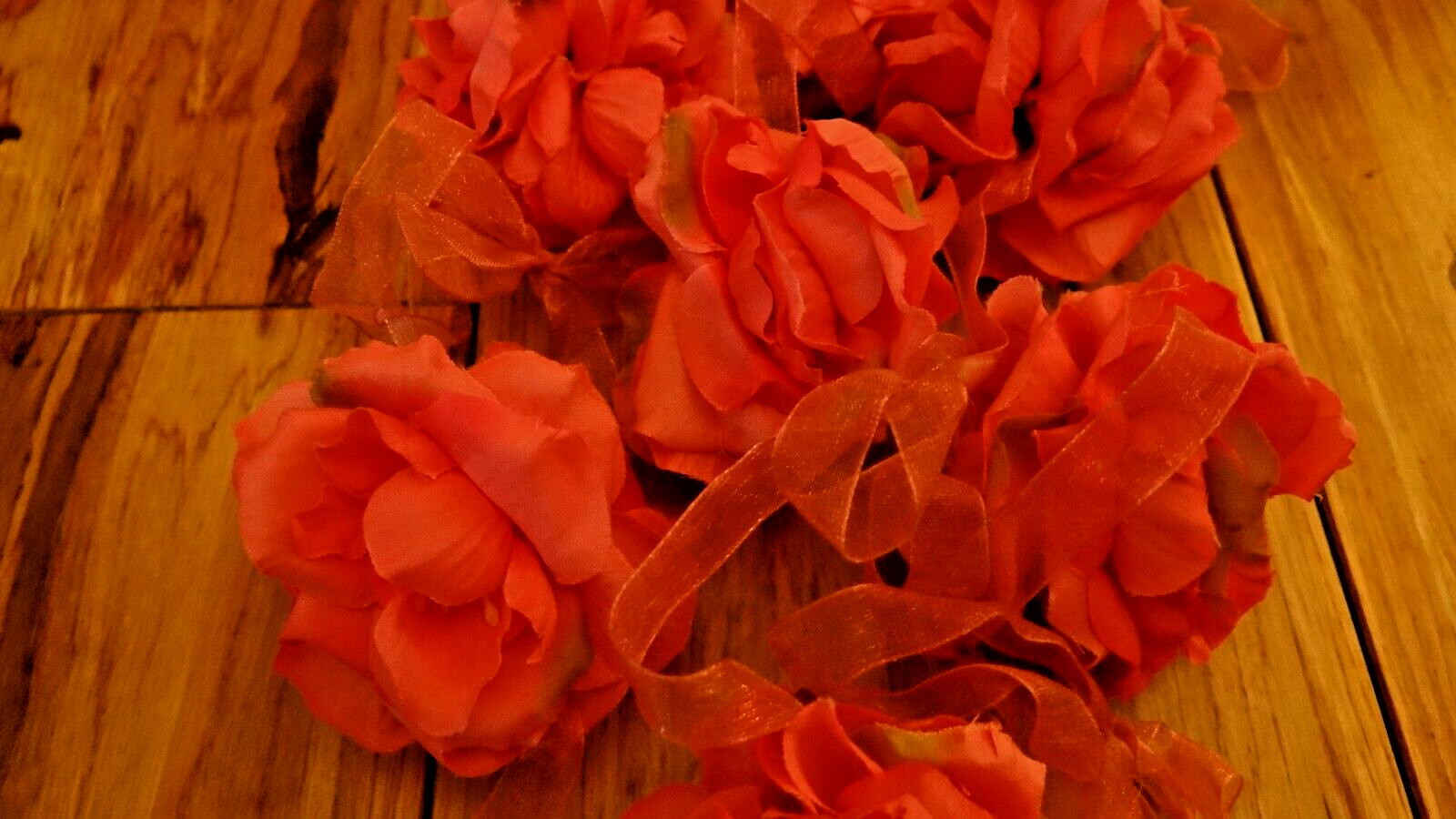 Pink Silk Rose Floral Garland Attached To Pink Organza Ribbon