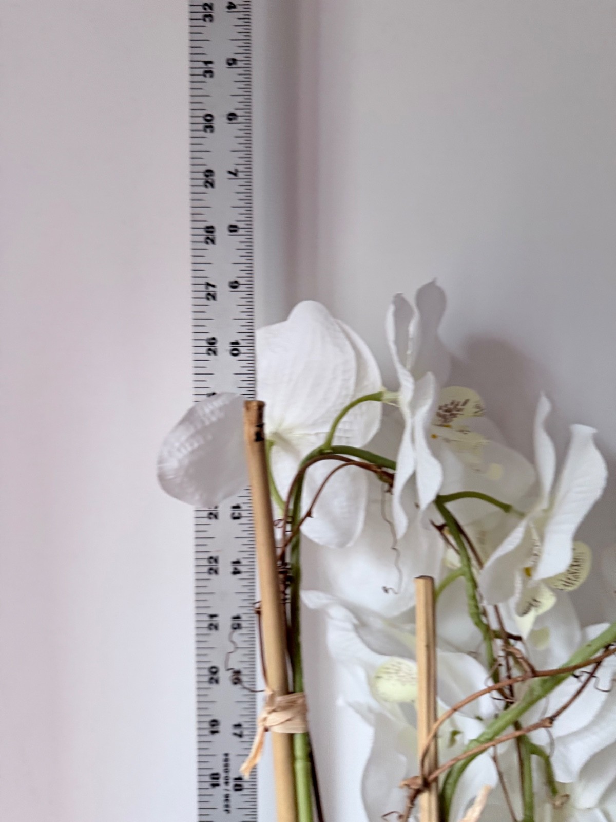 artificial white Phalaenopsis orchid arrangement in a brown textured vase 27”….